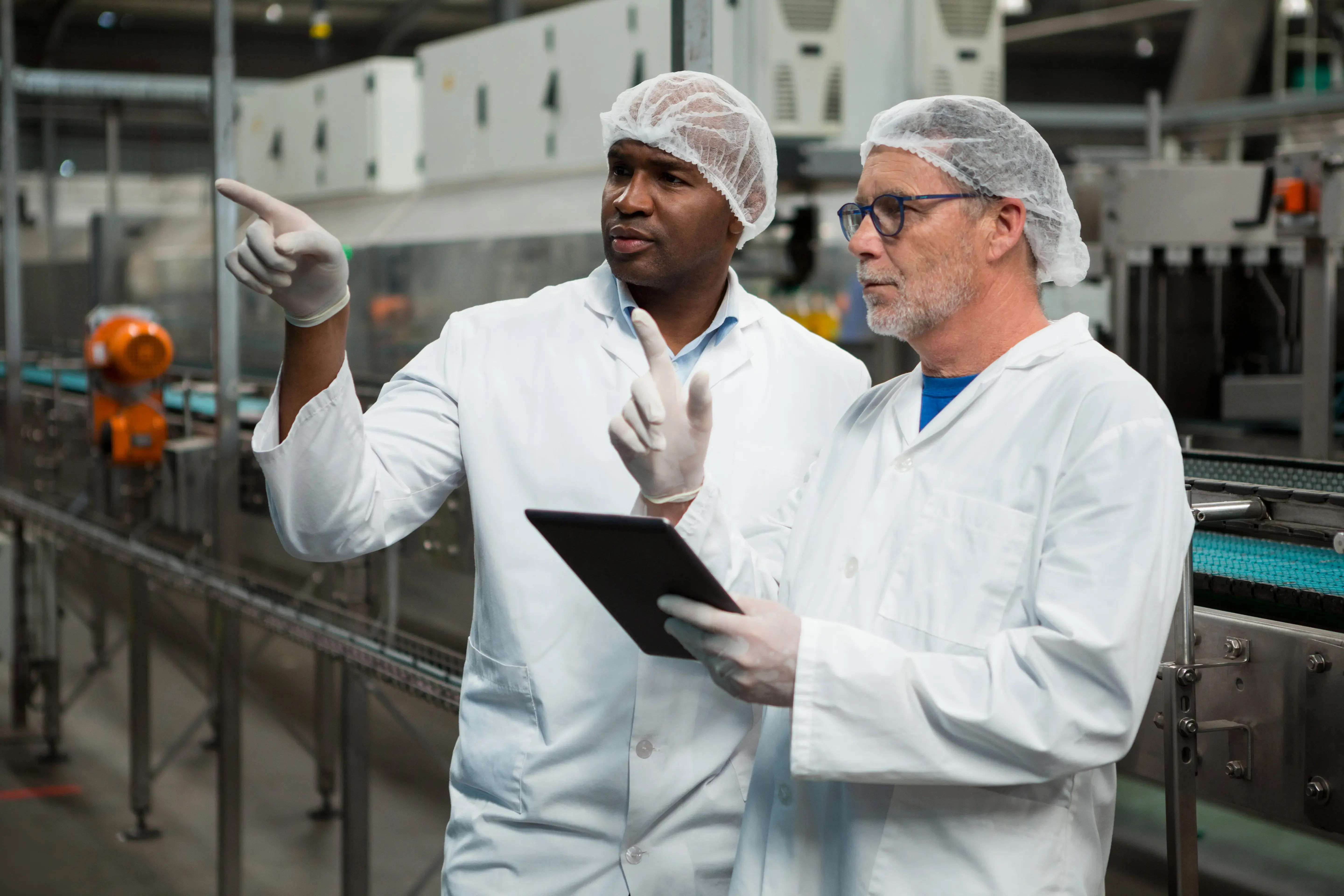 Vertical-Chemicals-workers with tablet